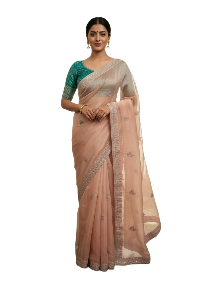 Soft Hatted Tissue Saree in Pastel Peach with Teal Embroidered Blouse
