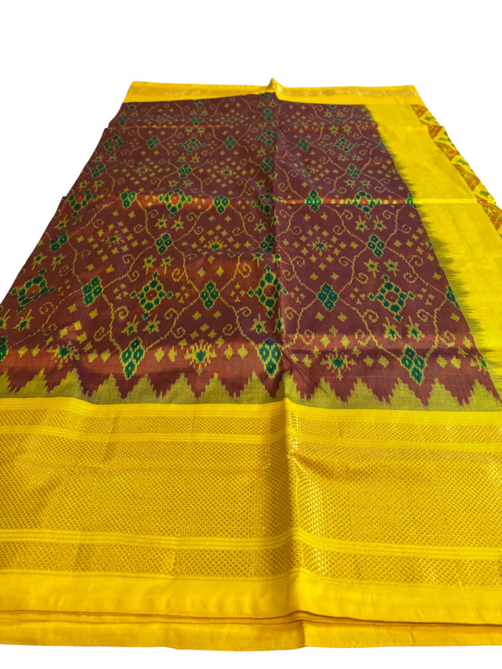 Ikkat Pochampally Silk Saree in Yellow with Traditional Diamond Weave