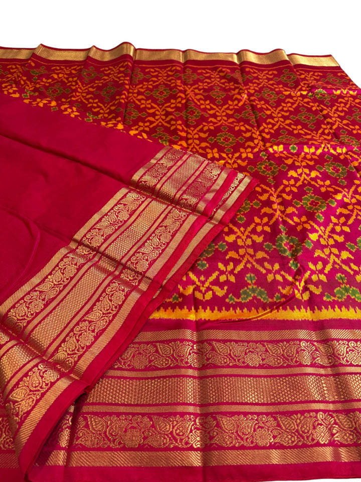 Premium Ikat Silk Saree in Vibrant Orange & Pink Floral Weave