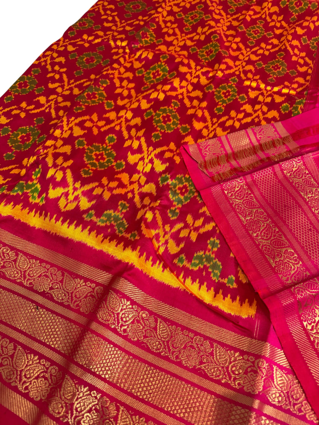 Premium Ikat Silk Saree in Vibrant Orange & Pink Floral Weave